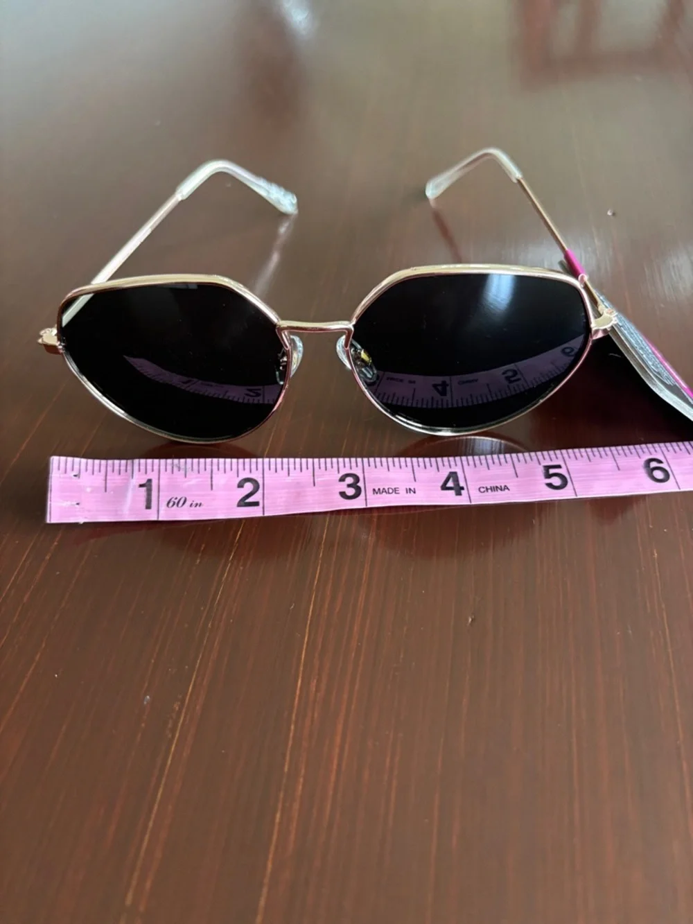 Foster Grant 100% UVA-UVB protect,gold round geometric frame, black lens